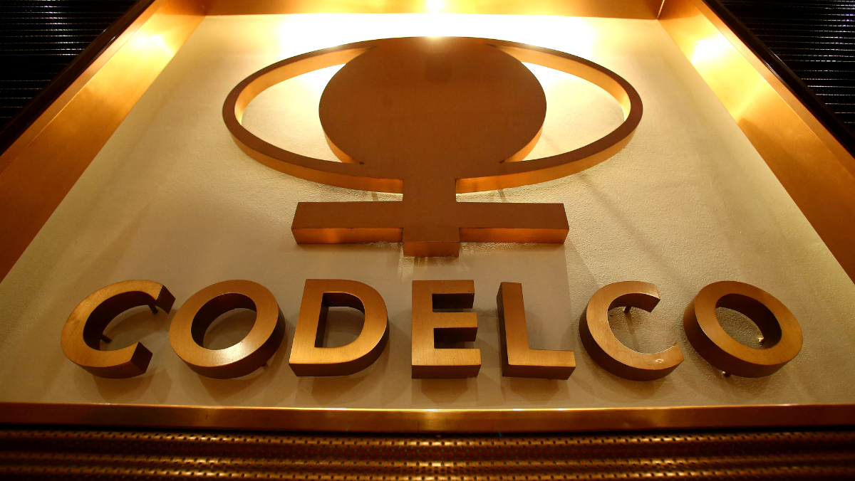Codelco copper-toned logo displayed on illuminated corporate wall