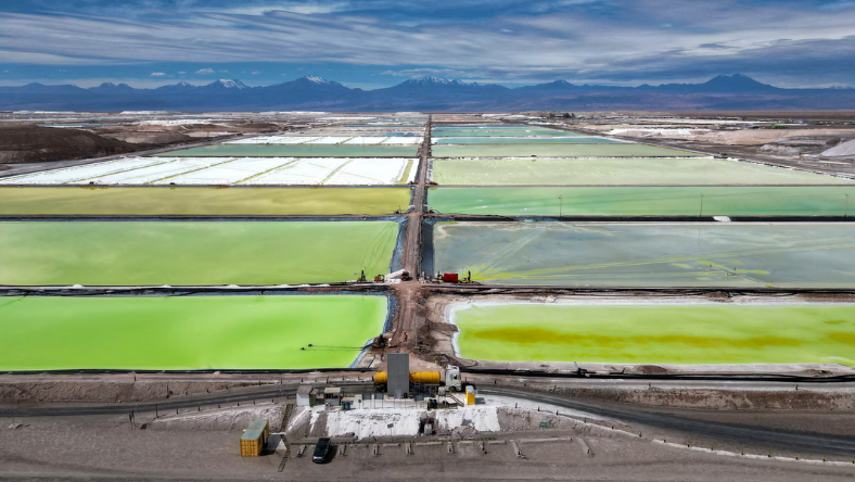 Aerial view of lithium evaporation ponds divided by roads in Chile’s Salar de Atacama